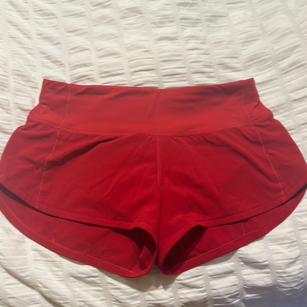 Like new-worn once- low rise-size 4 -2.5 red speed ups